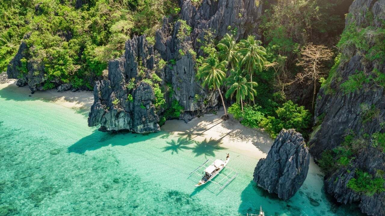 The Philippines does not recognize at-will employment. All terminations require either just cause (misconduct, gross negligence) or authorized cause (retrenchment, business closure), with specific notice and process requirements for each. The 13th-month pay is mandatory for all rank-and-file employees under Presidential Decree 851 3 and must be paid by December 24. Employees who continue working past 6 months of probation are automatically considered regularized under the Labor Code.